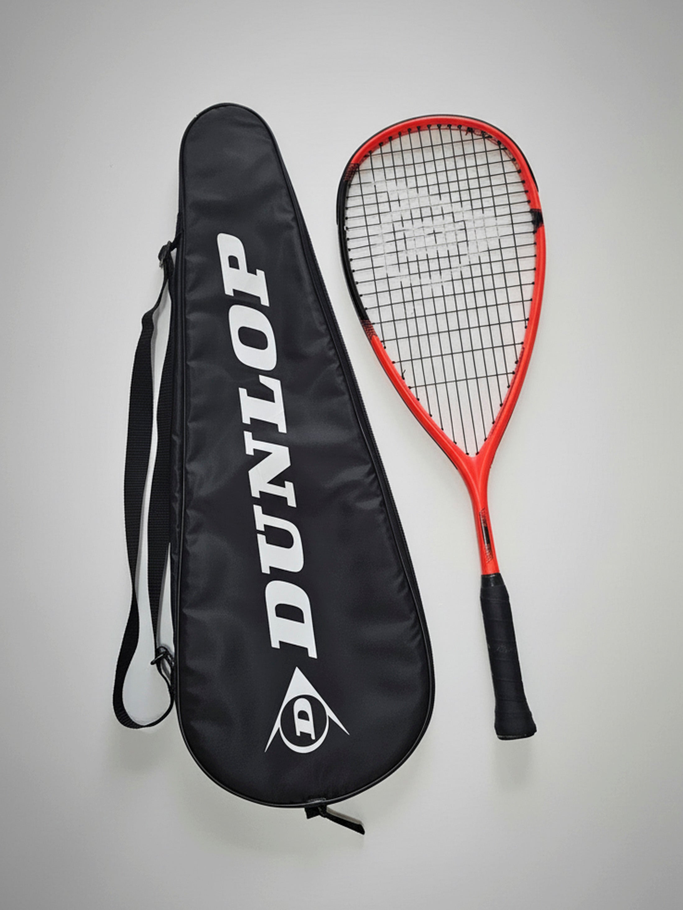 Orange Dunlop Squash Racket